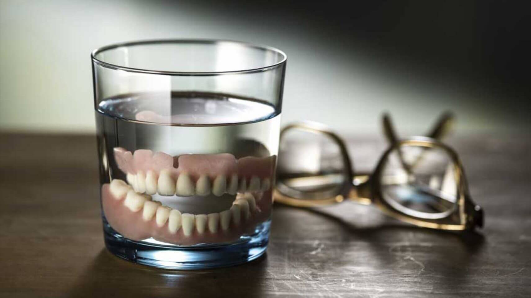 dentures in glass